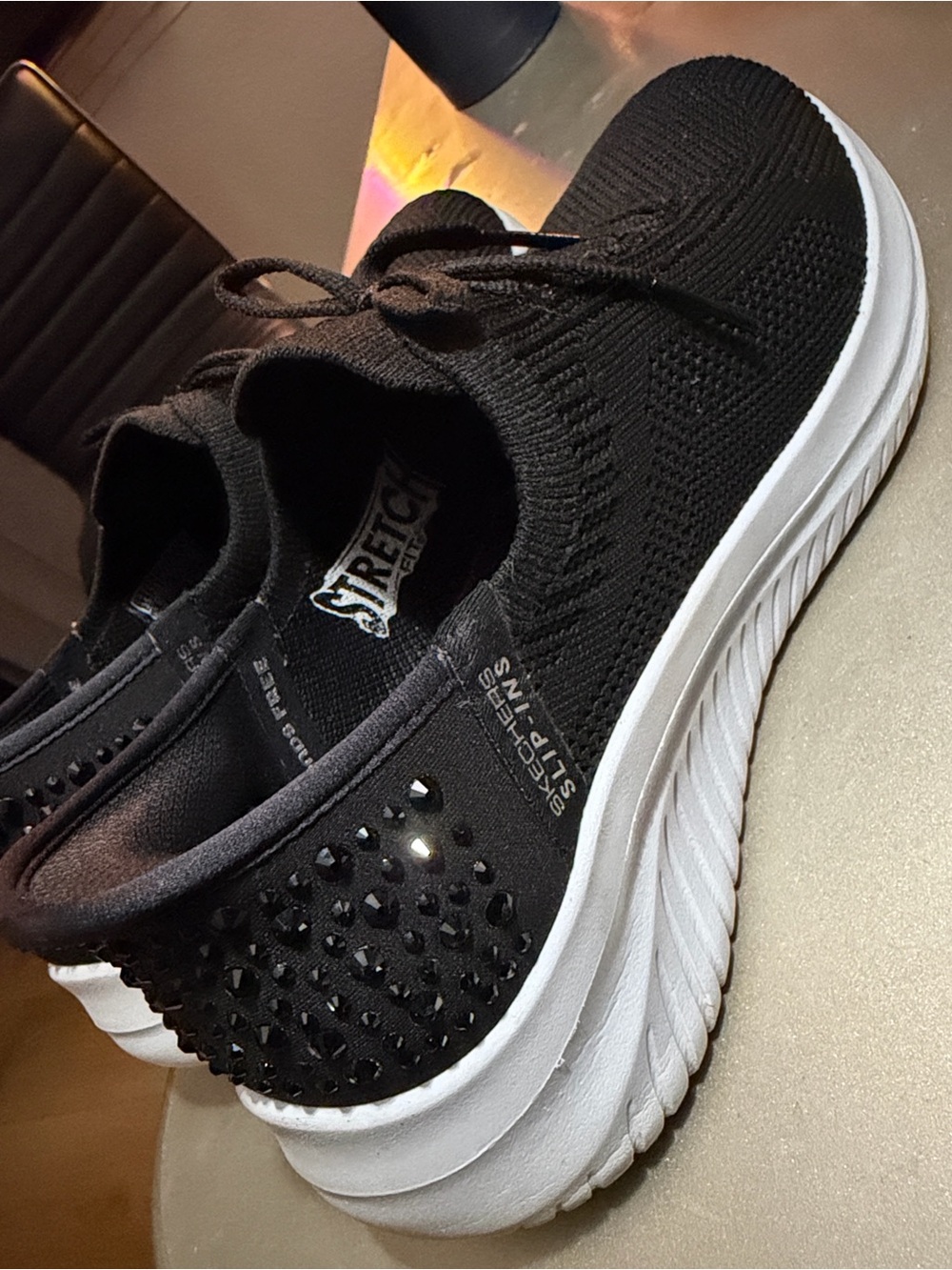 Skechers Black Knit Slip-On Sneakers with White Sole and Studded Heel